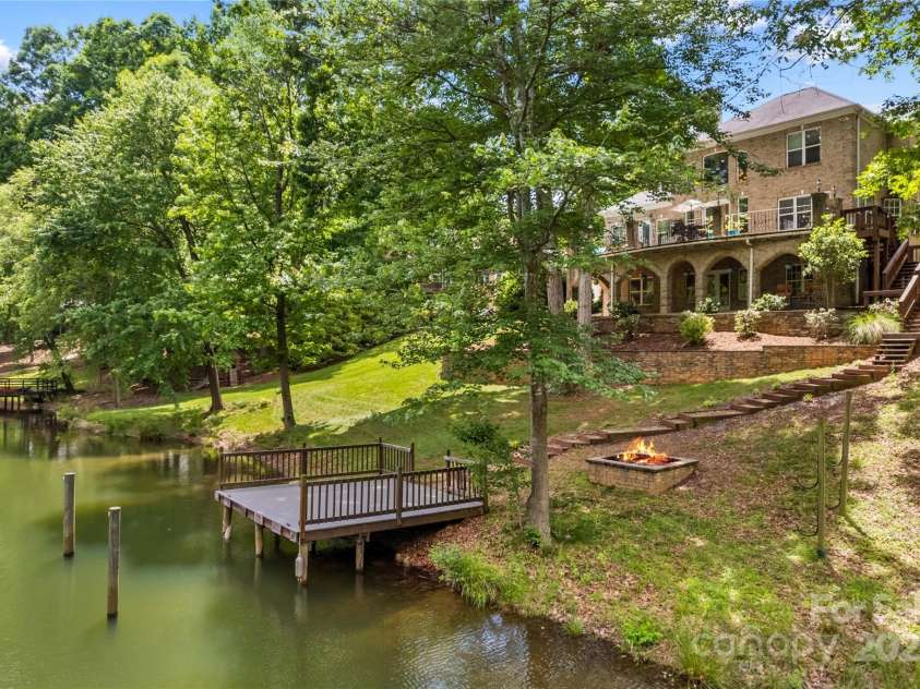 141 Ridge Top Road, Mooresville, NC 28117.  MLS# CAR4255912, YatesRealty ID 19205. Private dock