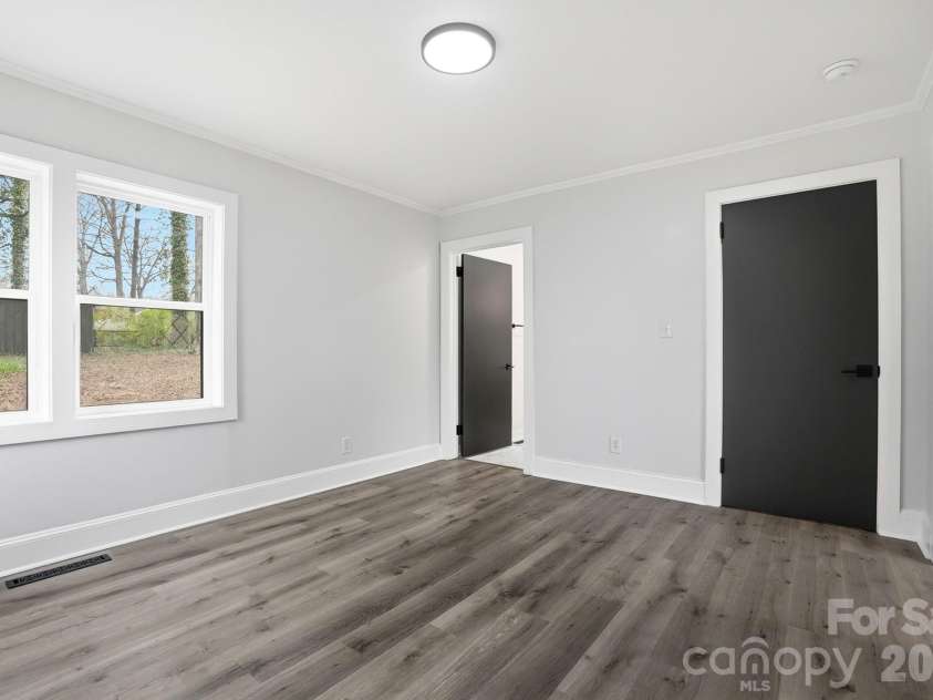 308 Rankin Avenue, Lowell, NC 28098.  MLS# CAR4356576, YatesRealty ID 19205. Second Bedroom Downstairs