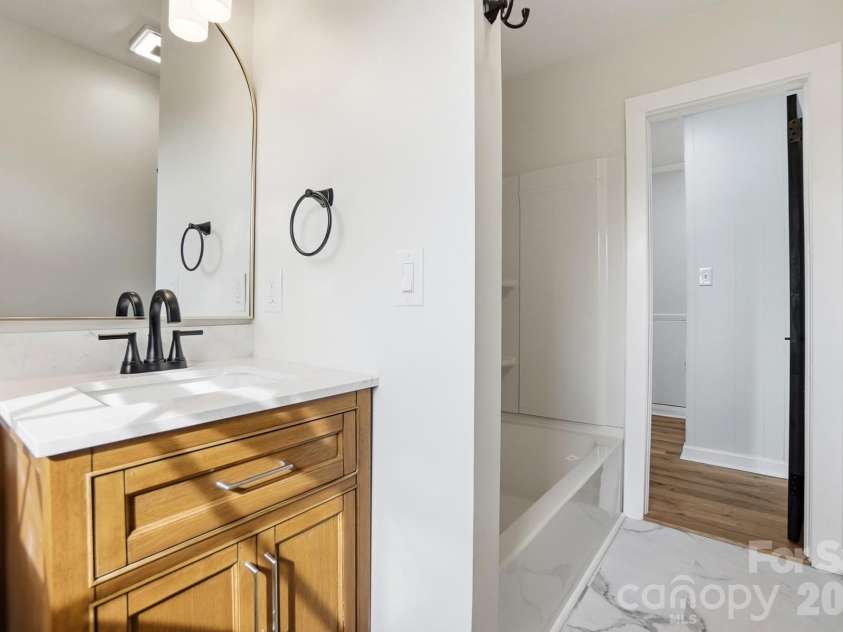 308 Rankin Avenue, Lowell, NC 28098.  MLS# CAR4356576, YatesRealty ID 19205. Secondary Bathroom Upstairs