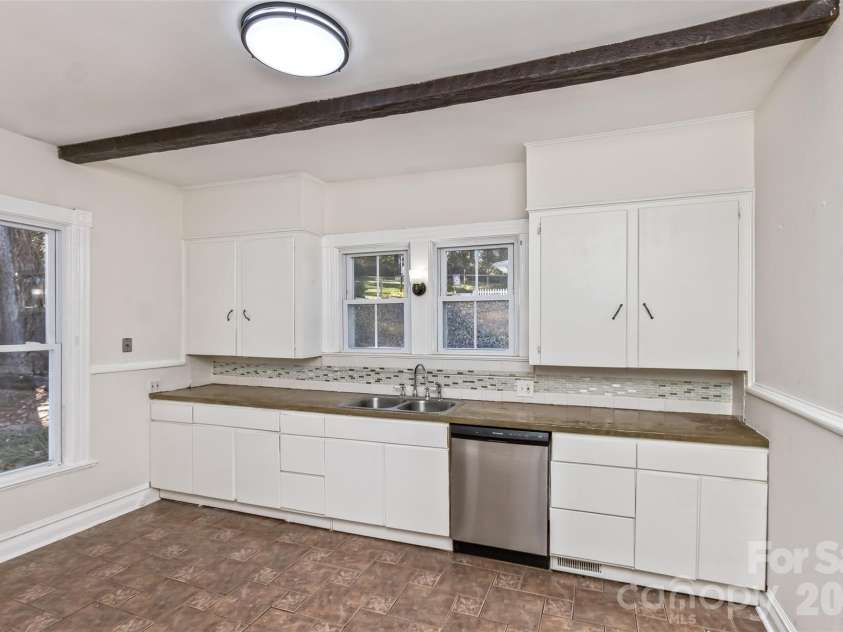 195 Terrace Drive, Canton, NC 28716.  MLS# CAR4319242, YatesRealty ID 19206. Kitchen with custom concrete countertops