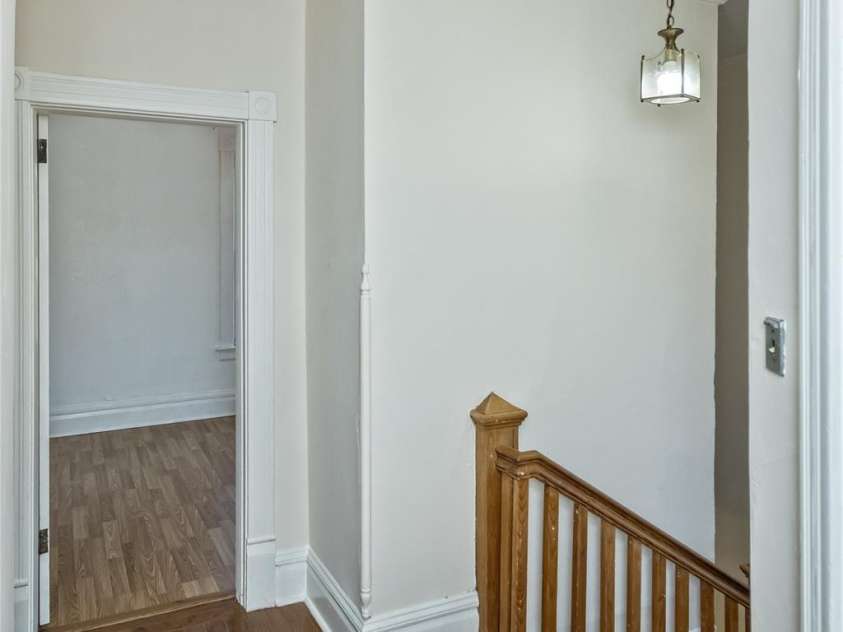 195 Terrace Drive, Canton, NC 28716.  MLS# CAR4319242, YatesRealty ID 19206. Stairway leading to main floor