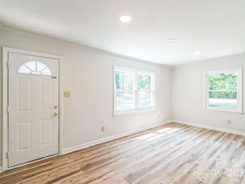 711 John Street, Matthews, NC 28105.  MLS# CAR4221107, YatesRealty ID 19207. 
