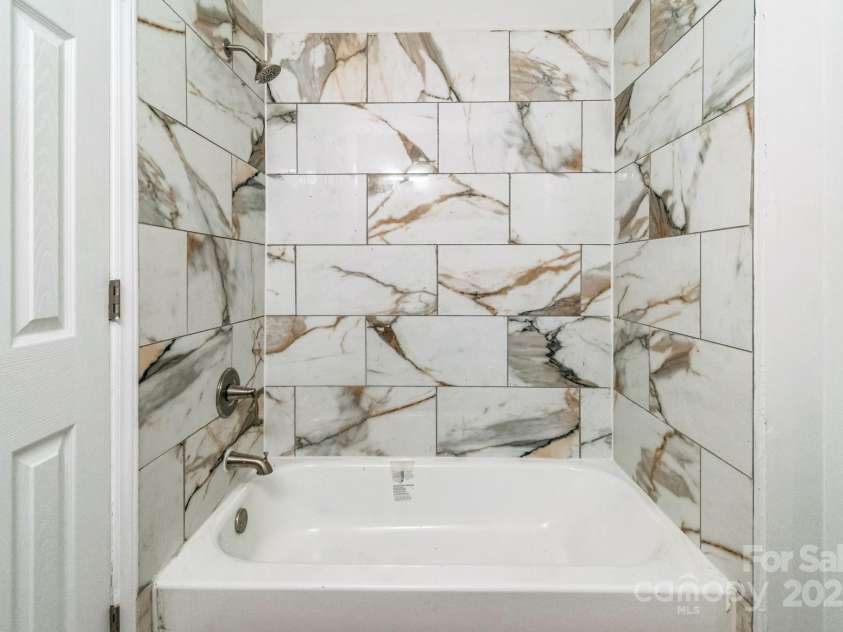 711 John Street, Matthews, NC 28105.  MLS# CAR4221107, YatesRealty ID 19207. 