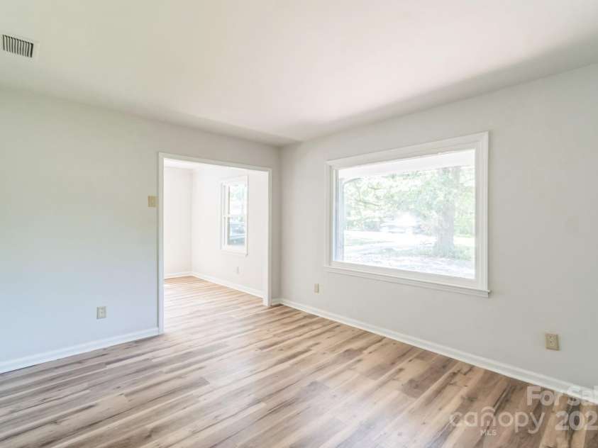 711 John Street, Matthews, NC 28105.  MLS# CAR4221107, YatesRealty ID 19207. 