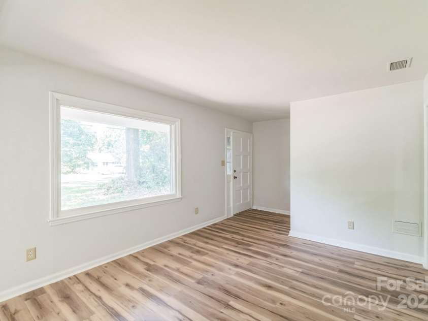 711 John Street, Matthews, NC 28105.  MLS# CAR4221107, YatesRealty ID 19207. 