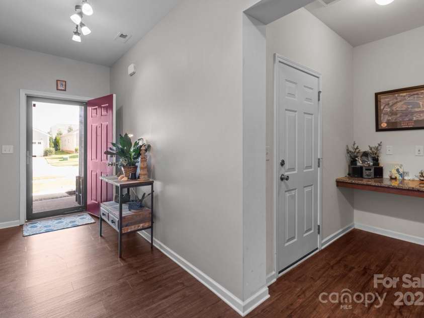 185 Willow Valley Drive, Mooresville, NC 28115.  MLS# CAR4267413, YatesRealty ID 19209. Foyer/garage interior door