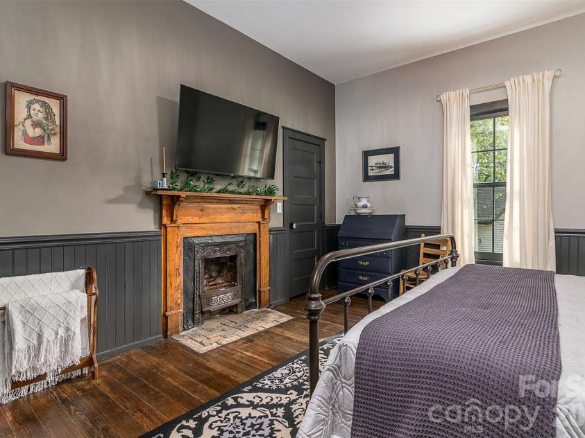 518 Sharpe Street, Statesville, NC 28677.  MLS# CAR4359455, YatesRealty ID 19209. Bedroom 2 w/Faux Decorative Fireplace