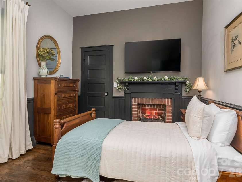 518 Sharpe Street, Statesville, NC 28677.  MLS# CAR4359455, YatesRealty ID 19209. Bedroom 3 w/Electric Insert Fireplace