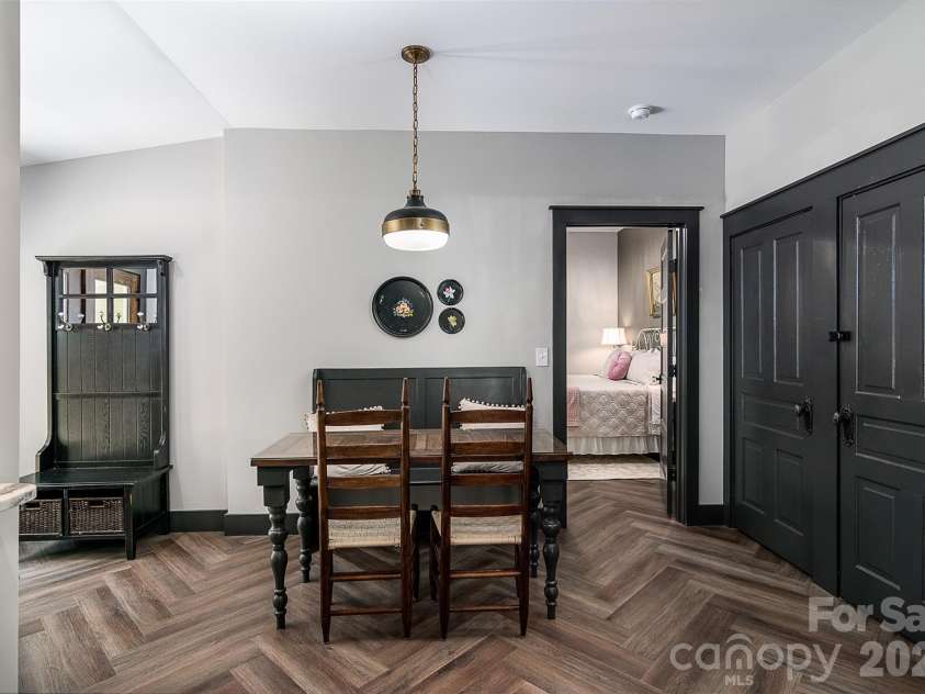 518 Sharpe Street, Statesville, NC 28677.  MLS# CAR4359455, YatesRealty ID 19209. Dining Area w/Herringbone LVP Flooring