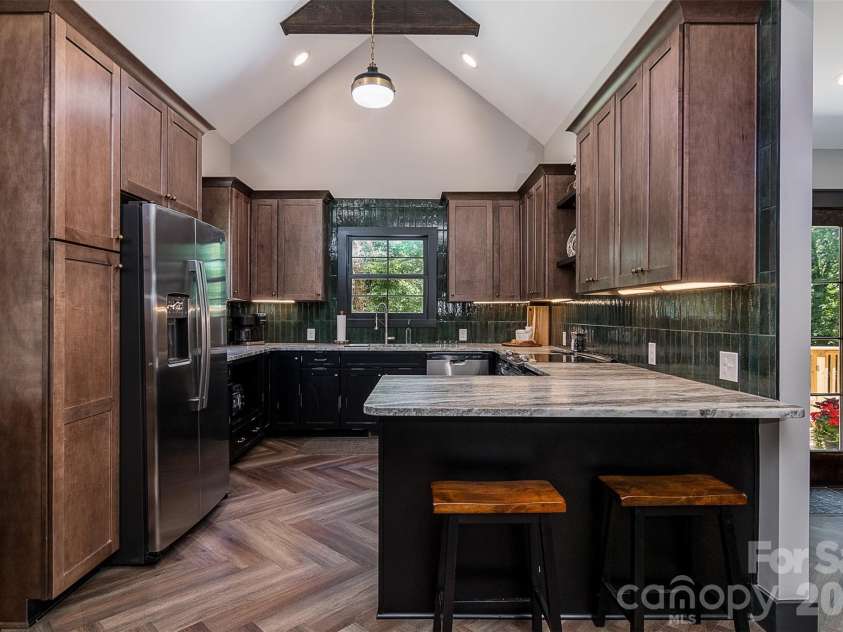518 Sharpe Street, Statesville, NC 28677.  MLS# CAR4359455, YatesRealty ID 19209. Gourmet Kitchen w/Eat-At Breakfast Bar