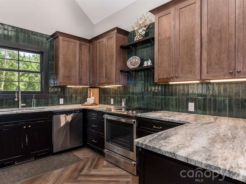 518 Sharpe Street, Statesville, NC 28677.  MLS# CAR4359455, YatesRealty ID 19209. Gourmet Kitchen w/Leathered Granite Counters