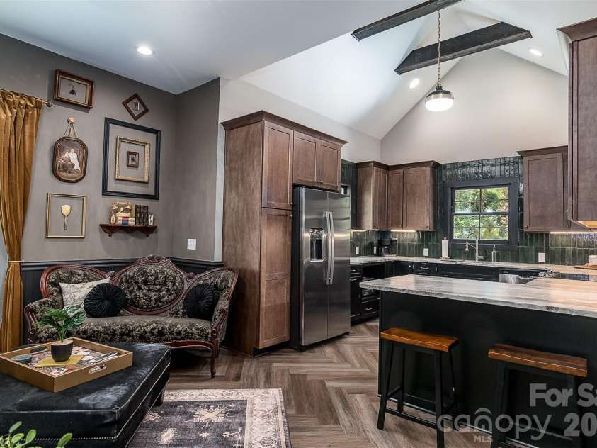 518 Sharpe Street, Statesville, NC 28677.  MLS# CAR4359455, YatesRealty ID 19209. Living Area Open to Kitchen
