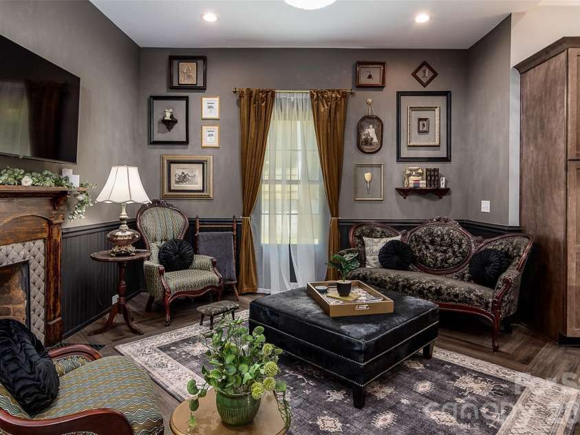 518 Sharpe Street, Statesville, NC 28677.  MLS# CAR4359455, YatesRealty ID 19209. Living Area w/Herringbone LVP Flooring