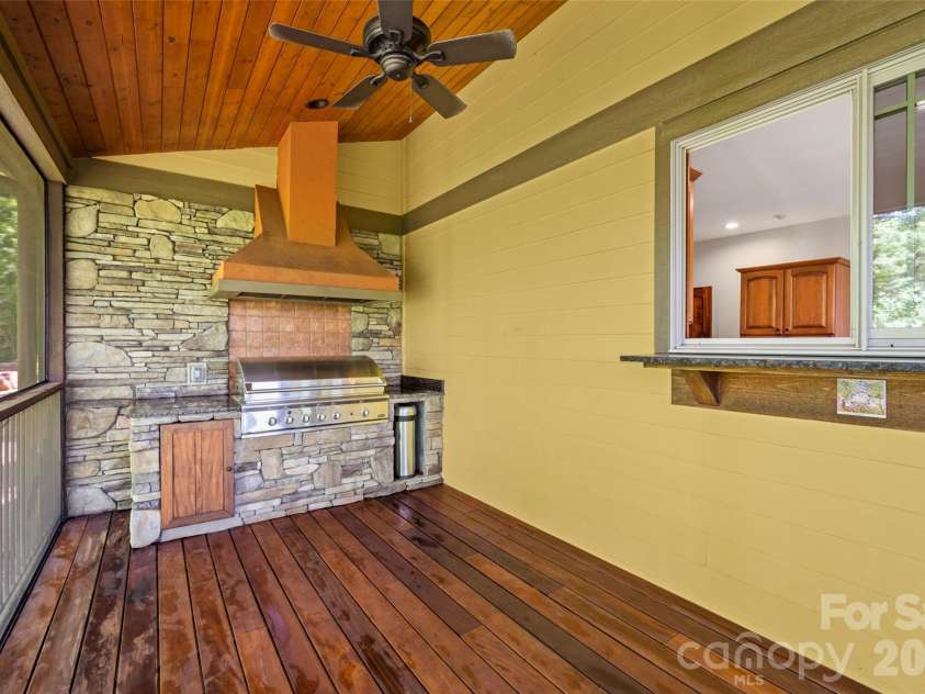 556 High Pines Loop, Lake Lure, NC 28746.  MLS# CAR4375948, YatesRealty ID 19210. Exterior kitchen