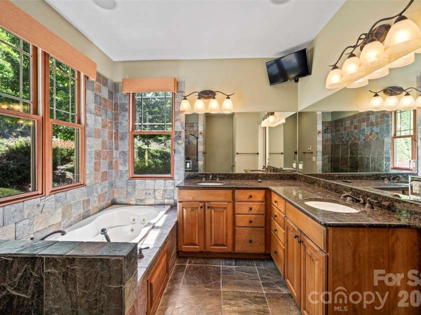556 High Pines Loop, Lake Lure, NC 28746.  MLS# CAR4375948, YatesRealty ID 19210. Primary Bathroom En Suite