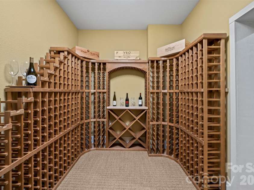 556 High Pines Loop, Lake Lure, NC 28746.  MLS# CAR4375948, YatesRealty ID 19210. Wine Cellar