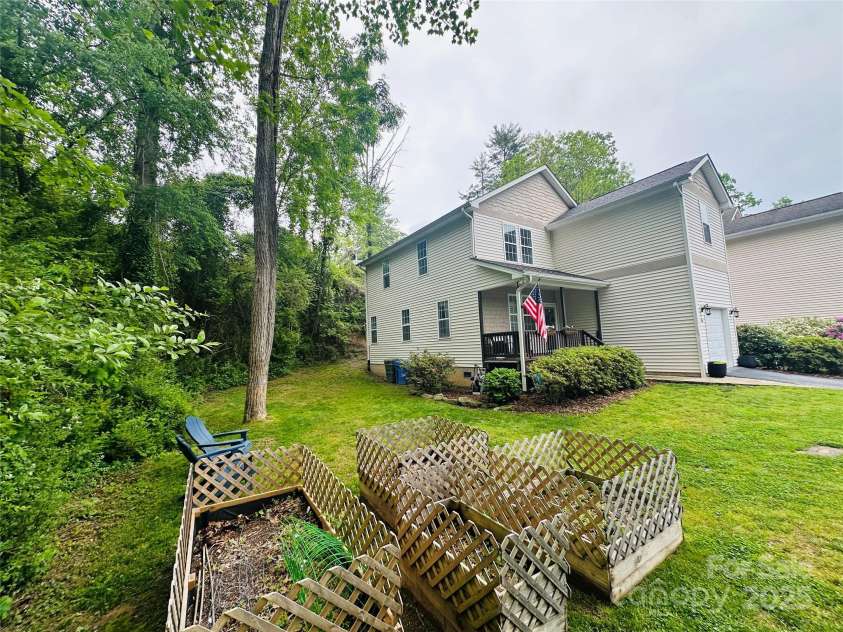 46 Cottage Court, Hendersonville, NC 28739.  MLS# CAR4256292, YatesRealty ID 19215. Side of Home