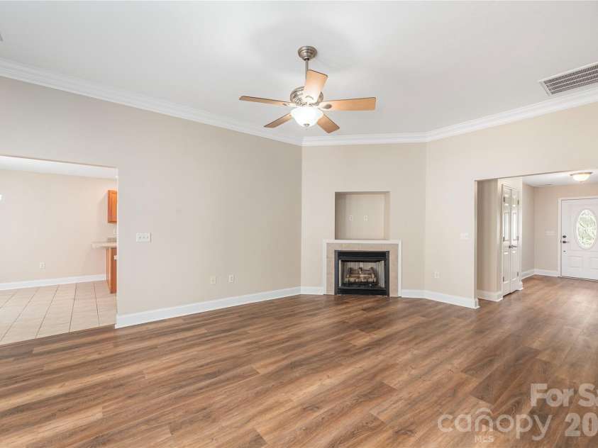 8 Kaylor Drive, Arden, NC 28704.  MLS# CAR4369533, YatesRealty ID 19216. Living room flows nicely into the kitchen.
