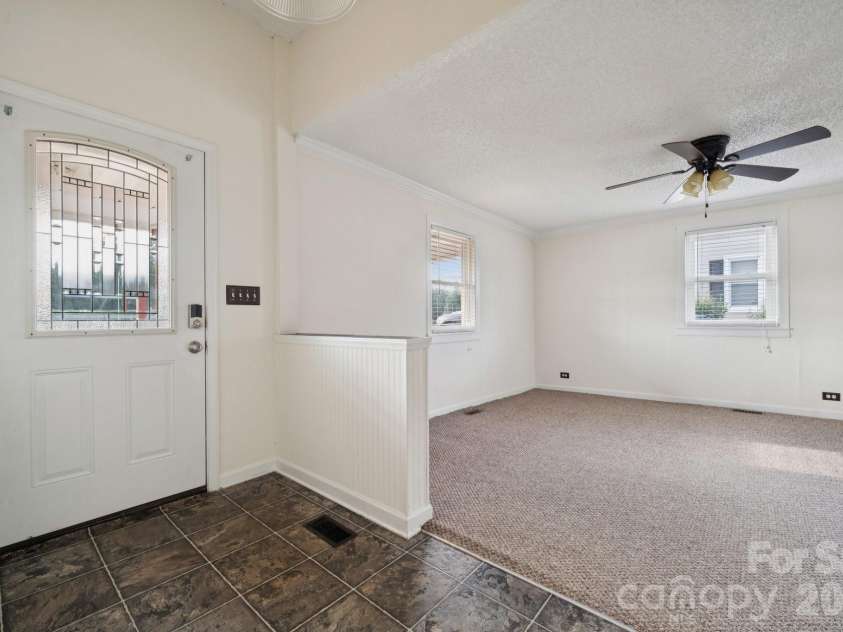 411 Central Avenue, Landis, NC 28088.  MLS# CAR4273594, YatesRealty ID 1922. Foyer to Living Room