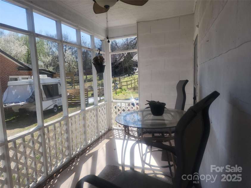 109 Oakland Avenue, Chester, SC 29706.  MLS# CAR4233781, YatesRealty ID 19220. Screened in SIDE porch with Ceiling Fan