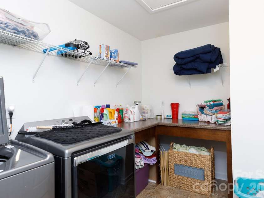 3121 Crosswind Drive, Fort Mill, SC 29707.  MLS# CAR4325644, YatesRealty ID 19228. Upstairs Laundry