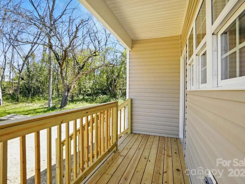 414 Clinton Avenue, Lancaster, SC 29720.  MLS# CAR4188657, YatesRealty ID 19228. Back porch