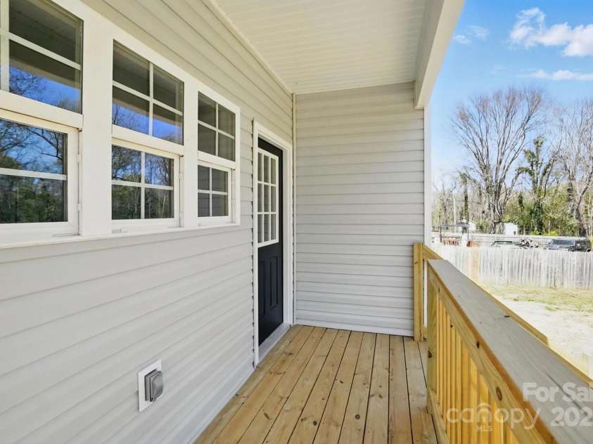416 Clinton Avenue, Lancaster, SC 29720.  MLS# CAR4235833, YatesRealty ID 19230. Back porch