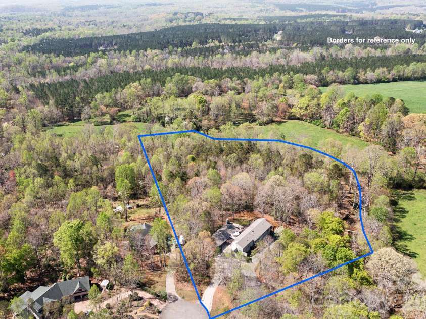 3249 Ivey Creek Road, Maiden, NC 28650.  MLS# CAR4241380, YatesRealty ID 19231. Situated on 5.25 Acres with a windig creek along right side border