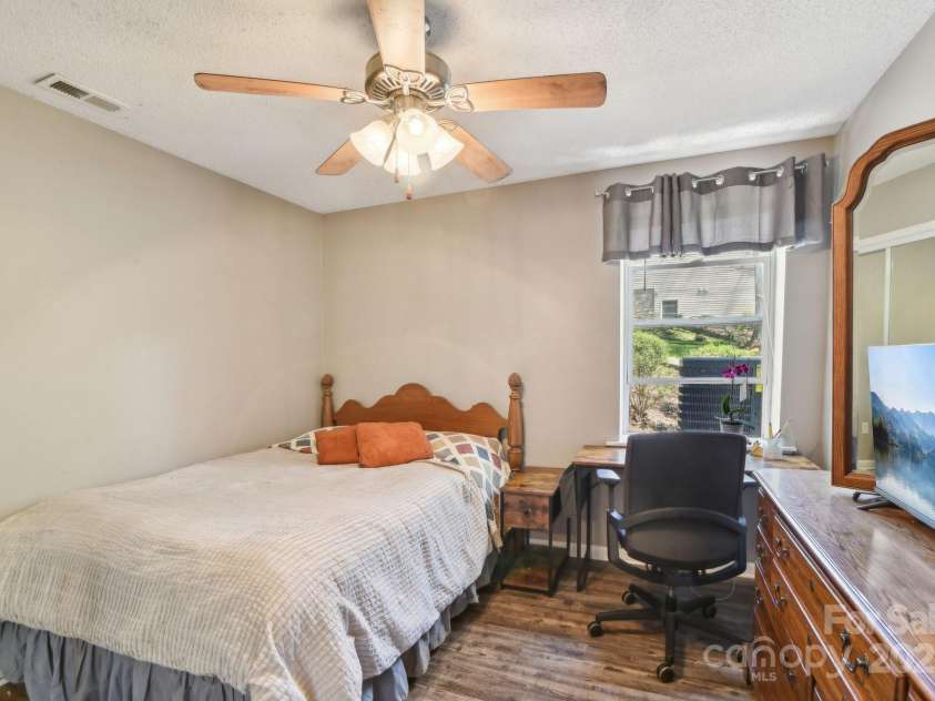 36 Queen Road, Candler, NC 28715.  MLS# CAR4245430, YatesRealty ID 19231. Guest Bedroom
