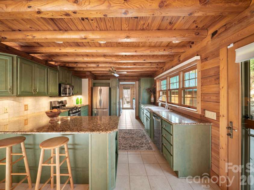 219 Woodlyn Etch Drive, Hendersonville, NC 28792.  MLS# CAR4351389, YatesRealty ID 19232. 
