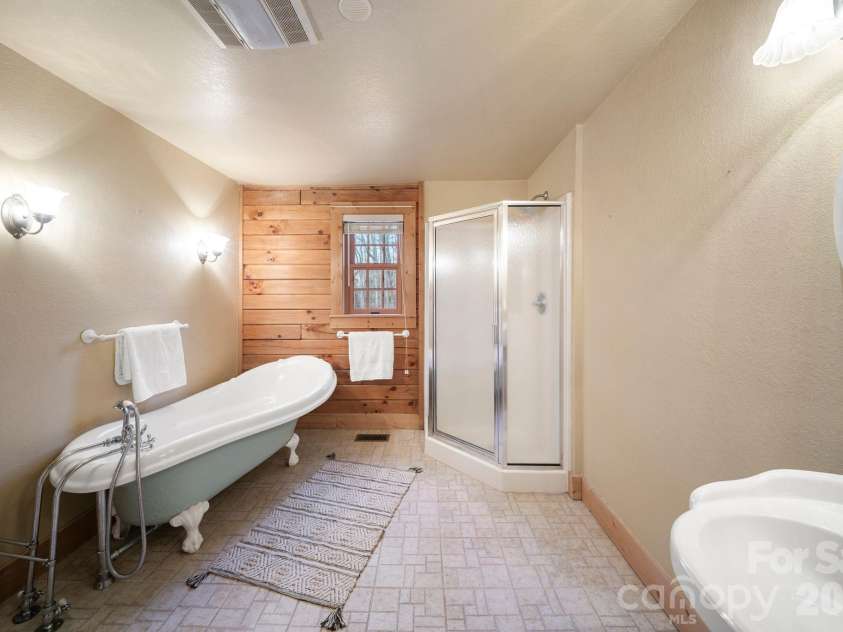 219 Woodlyn Etch Drive, Hendersonville, NC 28792.  MLS# CAR4351389, YatesRealty ID 19232. 