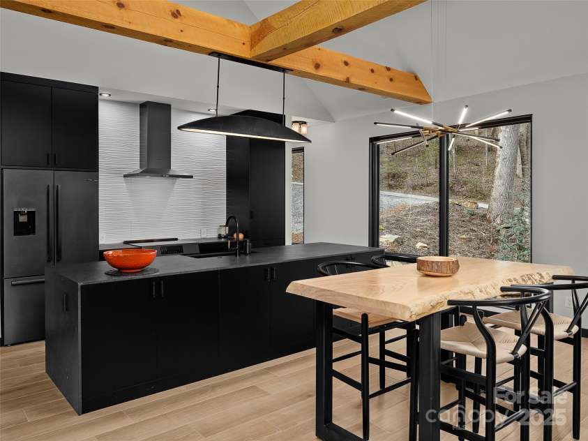 80 Hemlock Circle, Black Mountain, NC 28711.  MLS# CAR4252035, YatesRealty ID 19236. Dining Room into the kitchen