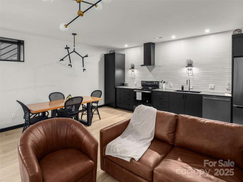 80 Hemlock Circle, Black Mountain, NC 28711.  MLS# CAR4252035, YatesRealty ID 19236. Downstairs Living Area