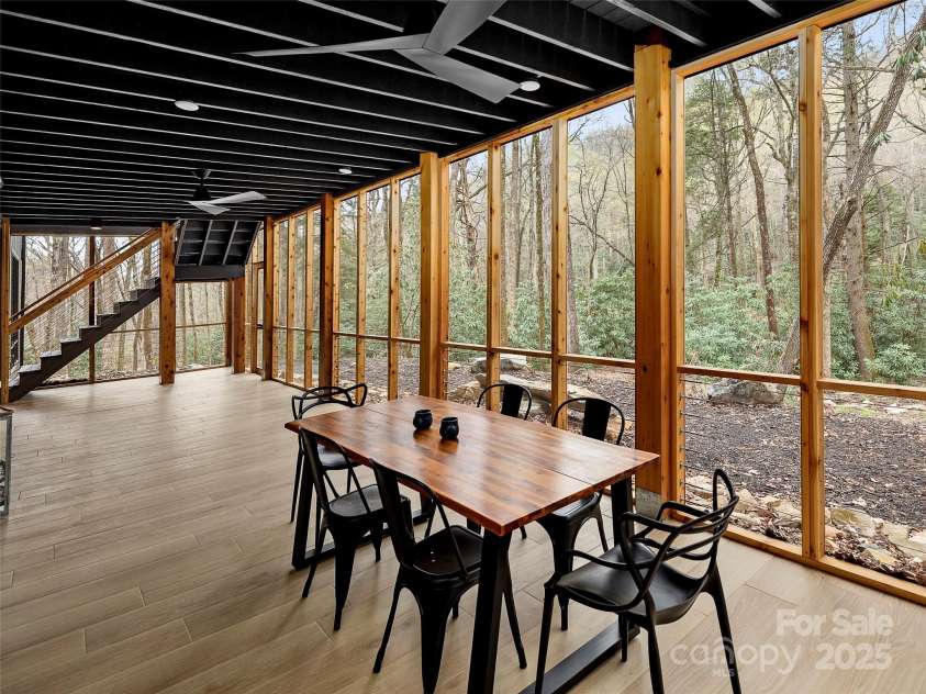 80 Hemlock Circle, Black Mountain, NC 28711.  MLS# CAR4252035, YatesRealty ID 19236. Downstairs porch