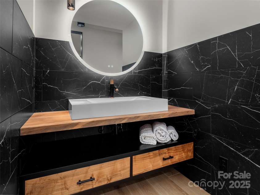 80 Hemlock Circle, Black Mountain, NC 28711.  MLS# CAR4252035, YatesRealty ID 19236. Downstairs sink and Vanity