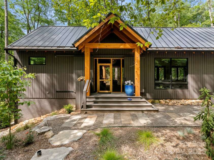80 Hemlock Circle, Black Mountain, NC 28711.  MLS# CAR4252035, YatesRealty ID 19236. Here is the front entrance to the breezeway to access the different sections of the house.