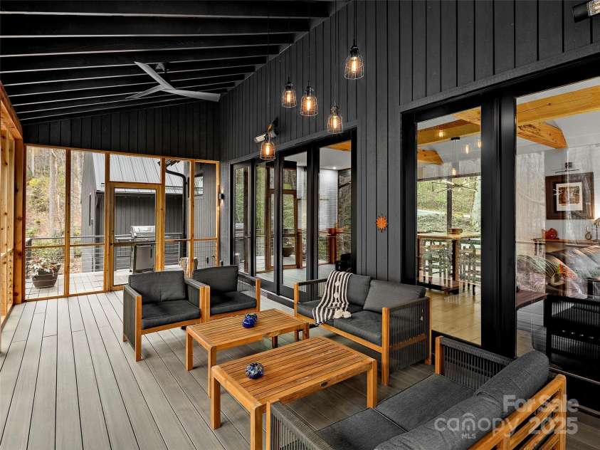 80 Hemlock Circle, Black Mountain, NC 28711.  MLS# CAR4252035, YatesRealty ID 19236. Walk out of the screened in deck to the grill with a propane line in place.