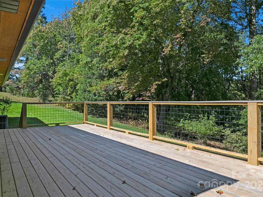 181 Pleasant Hill Drive, Brevard, NC 28712.  MLS# CAR4247052, YatesRealty ID 19238. Enjoy 376 Square Feet Of Back Deck Space
