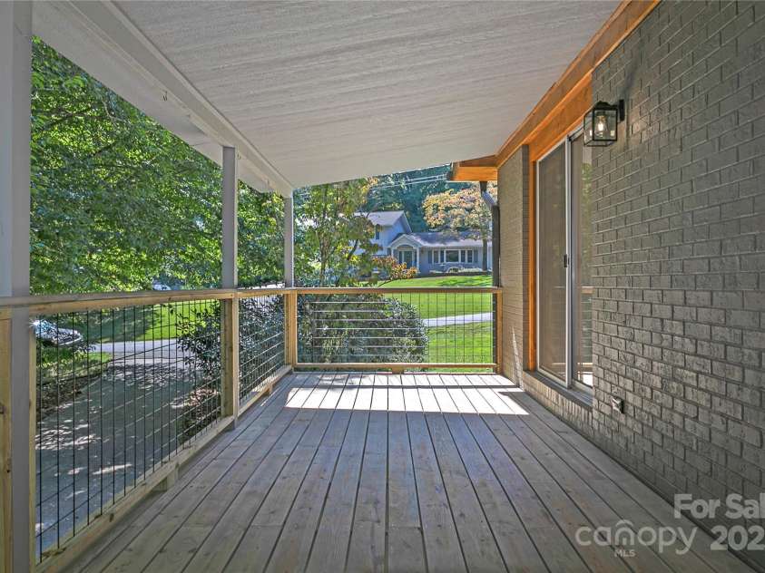 181 Pleasant Hill Drive, Brevard, NC 28712.  MLS# CAR4247052, YatesRealty ID 19238. Enjoy A Covered Deck Right Off Your Living Room