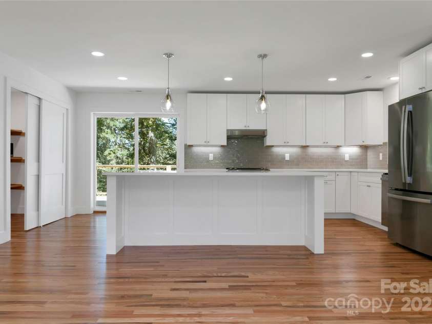 181 Pleasant Hill Drive, Brevard, NC 28712.  MLS# CAR4247052, YatesRealty ID 19238. New Modern Kitchen With A Massive Quartz Island 8x4 Feet