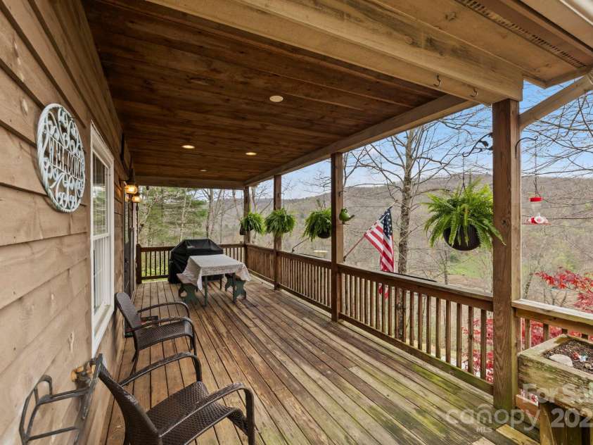 50 Honey Mountain Lane, Lake Toxaway, NC 28747.  MLS# CAR4243898, YatesRealty ID 19239. Nice covered front porch!