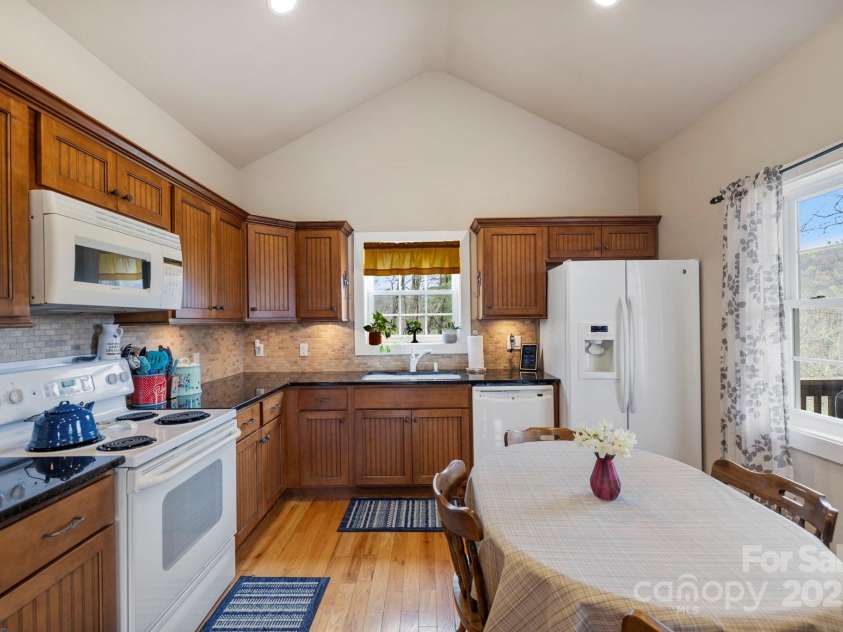 50 Honey Mountain Lane, Lake Toxaway, NC 28747.  MLS# CAR4243898, YatesRealty ID 19239. Views from the dining area!