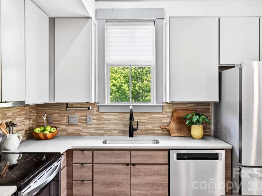 42 Schenck Parkway, Asheville, NC 28803.  MLS# CAR4377508, YatesRealty ID 1924. Custom space saving cabinet organizers
