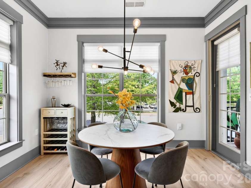 42 Schenck Parkway, Asheville, NC 28803.  MLS# CAR4377508, YatesRealty ID 1924. Dining area with access to covered balcony