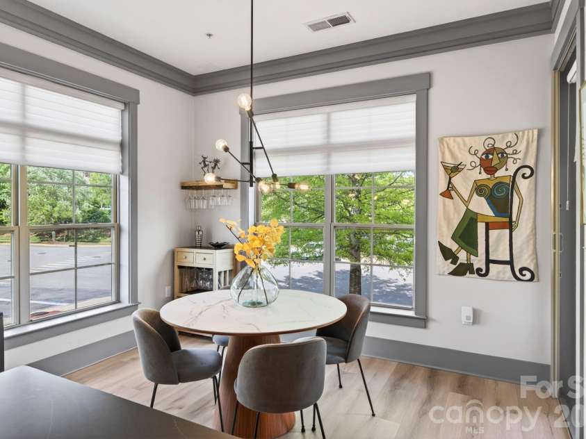 42 Schenck Parkway, Asheville, NC 28803.  MLS# CAR4377508, YatesRealty ID 1924. Expansive windows with tons of natural light and custom blinds