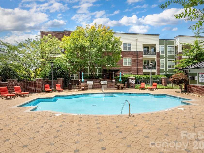 42 Schenck Parkway, Asheville, NC 28803.  MLS# CAR4377508, YatesRealty ID 1924. Grills and lounging chairs