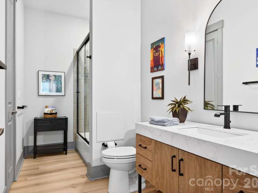 42 Schenck Parkway, Asheville, NC 28803.  MLS# CAR4377508, YatesRealty ID 1924. Modern vanity with quartz countertops
