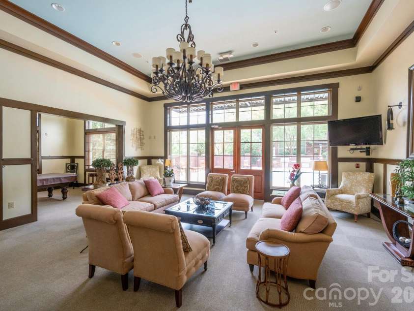 42 Schenck Parkway, Asheville, NC 28803.  MLS# CAR4377508, YatesRealty ID 1924. Pool table, TV and more