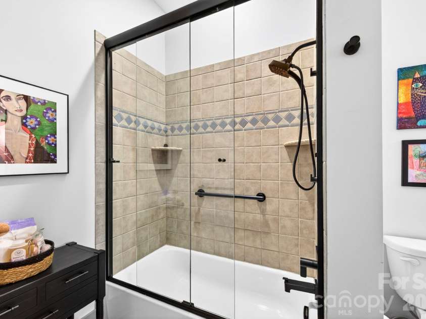 42 Schenck Parkway, Asheville, NC 28803.  MLS# CAR4377508, YatesRealty ID 1924. Tiled shower tub combo
