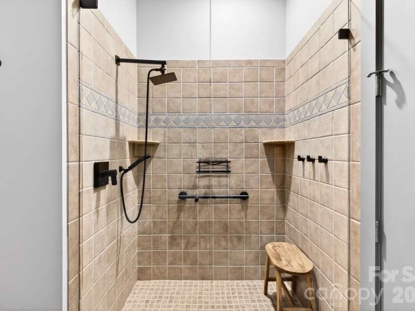 42 Schenck Parkway, Asheville, NC 28803.  MLS# CAR4377508, YatesRealty ID 1924. Tiled standup shower 